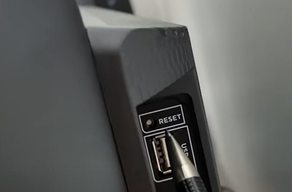 press the reset button on TCL Roku TV